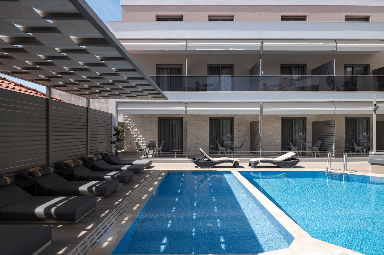 Tiara Holidays - Leon Villas - pool and sunbeds